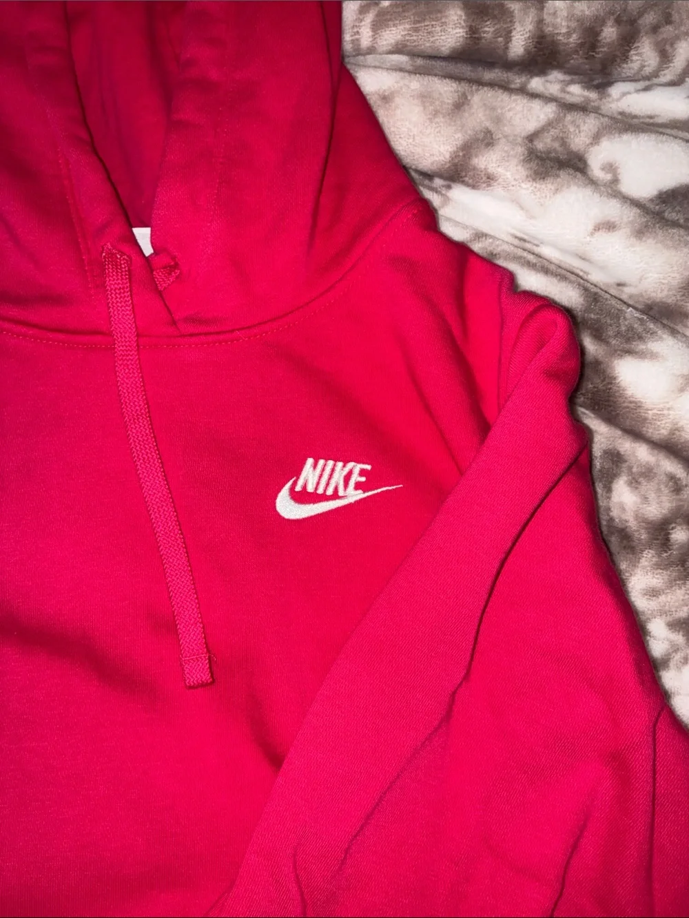 Hot pink women’s Nike sweatshirt